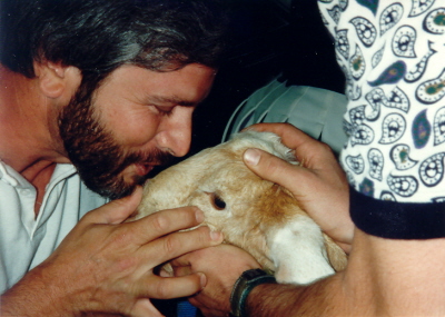 Senior Pep Rally Pitts kissing Goat